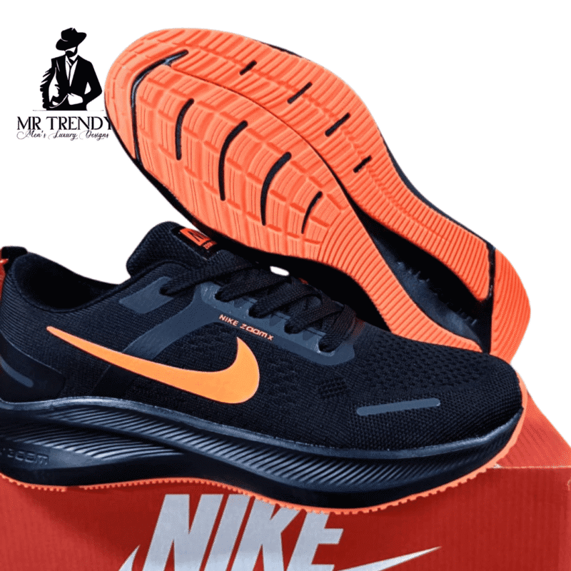 Orange Nike Air Zoom Trainers